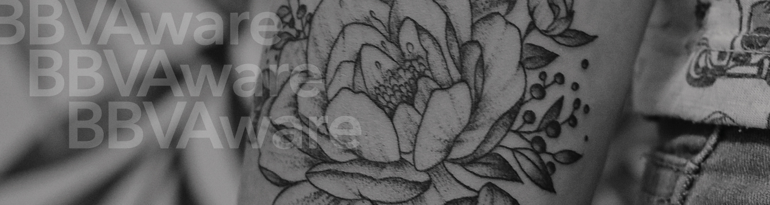 An image of part of a tattoo of a rose on an arm with the words BBV Aware.